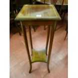 An Edwardian mahogany and line inlaid two tier plant stand, the top with diamond shaped satin wood