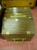 A modern wooden coal box with shaped brass hinges and brass handles, 43 x 47 cms, 52 cms deep