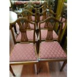 A reproduction set of eight (six plus two) mahogany dining chairs with pierced splat and