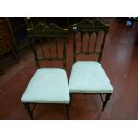A good pair of walnut carved side chairs with classical architectural style backs, broken swan