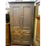 A Georgian scumbled pine cupboard, twin top doors with inset moulded edge panels, two central