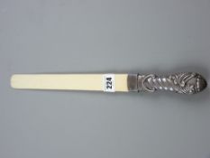 An ivory page turner with good scrolled silver handle, Birmingham 1897