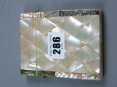 A mother of pearl card case with abalone and mother of pearl decorated edging, silver mount to the