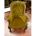 A Victorian carved mahogany spoonback chair with button back upholstery (for restoration)