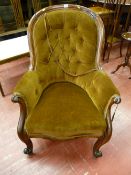 A Victorian carved mahogany spoonback chair with button back upholstery (for restoration)