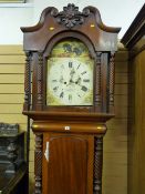 A Victorian mahogany longcase clock, the hood with broken swan neck pediment and central carved swag
