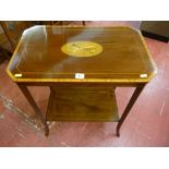 An Edwardian inlaid mahogany two tier side table, the top with canted corners, crossbanded,
