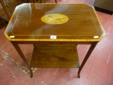 An Edwardian inlaid mahogany two tier side table, the top with canted corners, crossbanded,