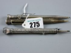 A bright cut silver encased Victorian fountain pen with two sliders, one for pencil and one for nib,