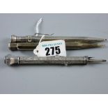 A bright cut silver encased Victorian fountain pen with two sliders, one for pencil and one for nib,