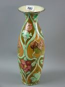 A Della Robbia vase decorated by Liz Wilkins and Arthur Bells, incised and relief decorated, unusual