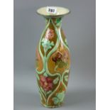 A Della Robbia vase decorated by Liz Wilkins and Arthur Bells, incised and relief decorated, unusual