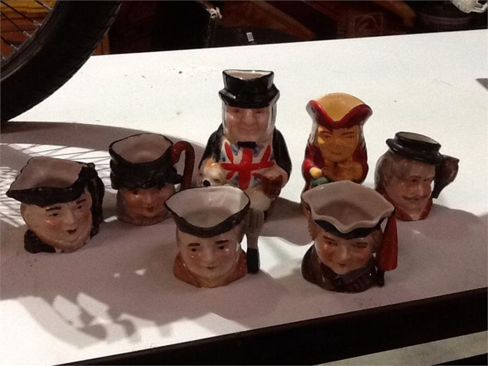 Collection of mini Toby jugs