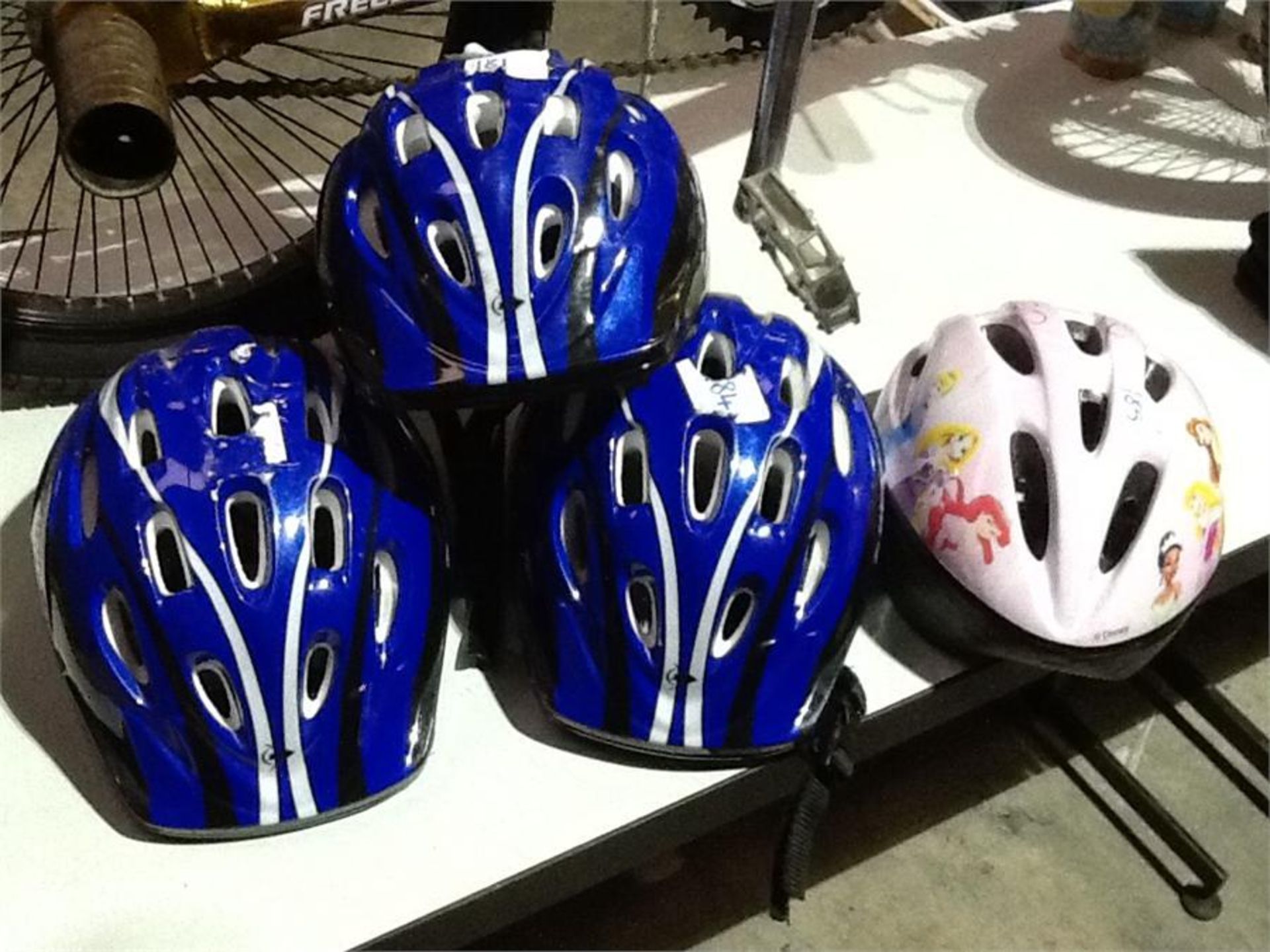 3 dunlop children's sports helmets & 1disney helmet