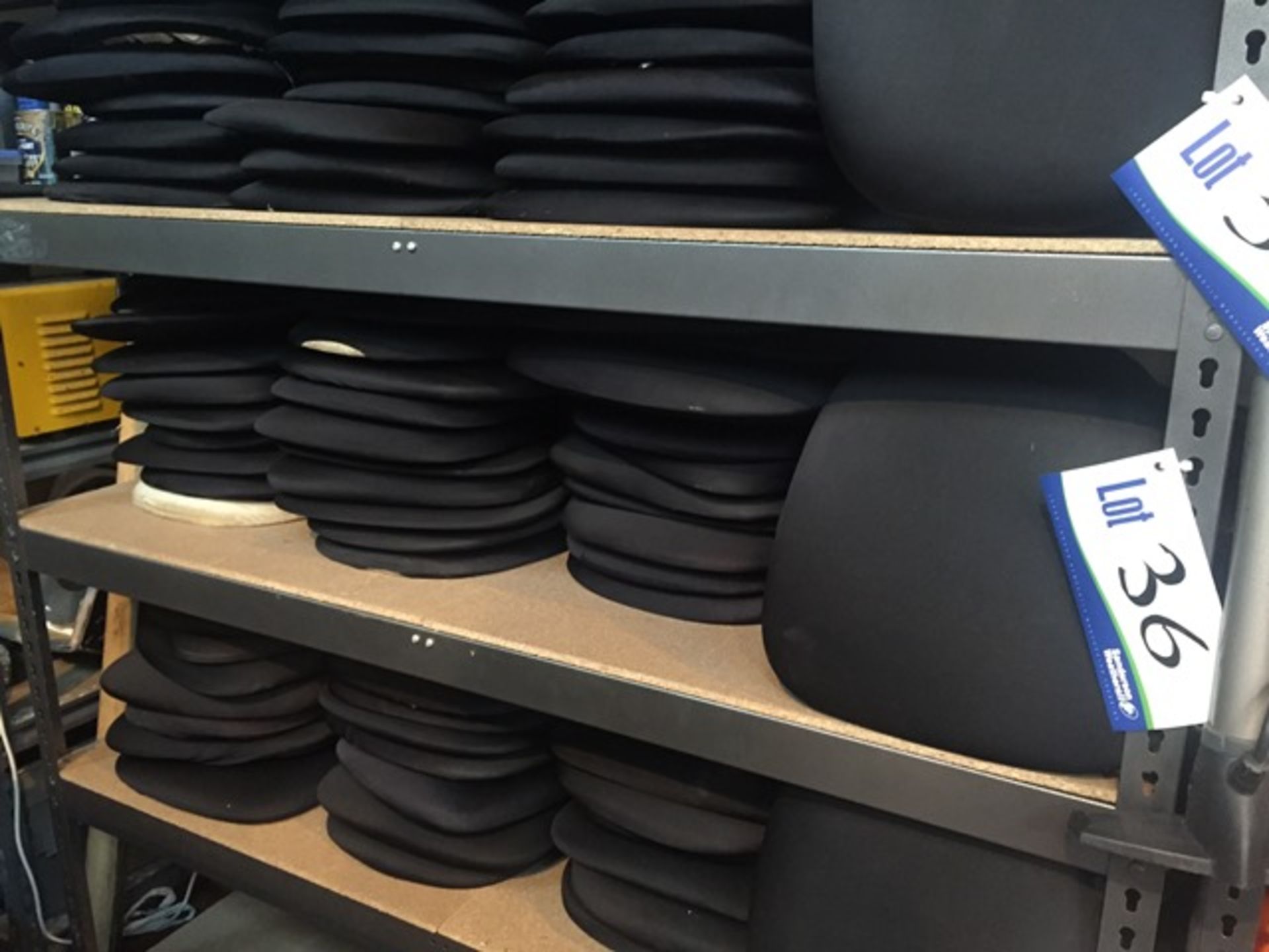 Forty Three Black Velcro Seat Pads as set out on shelving