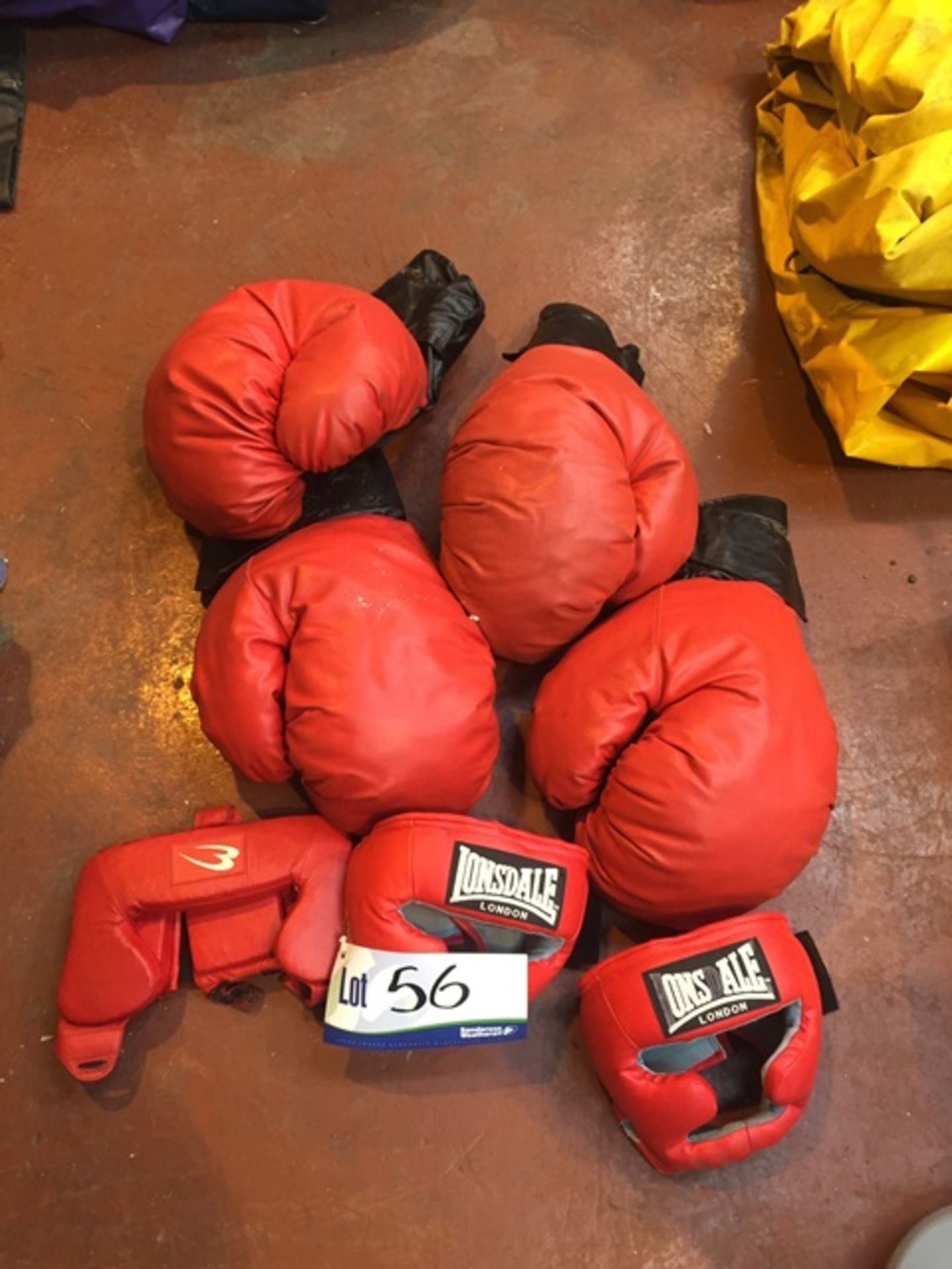 Two Pairs of Red Leather Oversized Boxing Gloves with Three Red Leather Headguards