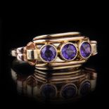 Allianzring mit Amethysten. 20th cent.  585er Gelbgold und Roségold. Ausladender, durchbrochen