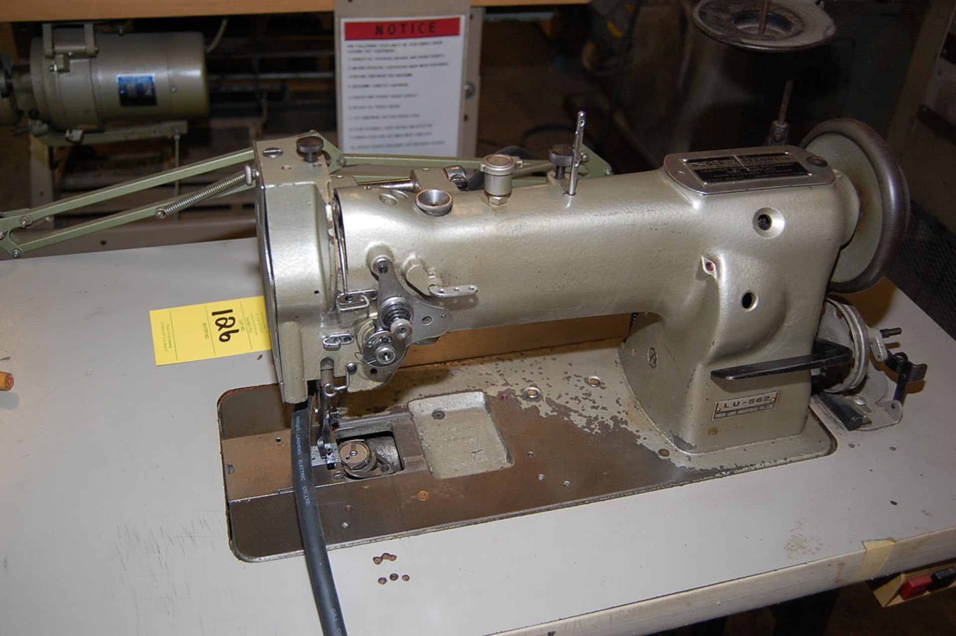 Juki Type #LU-562-E Sewing Machine, Mounted on Bench, SN 562-E-27901