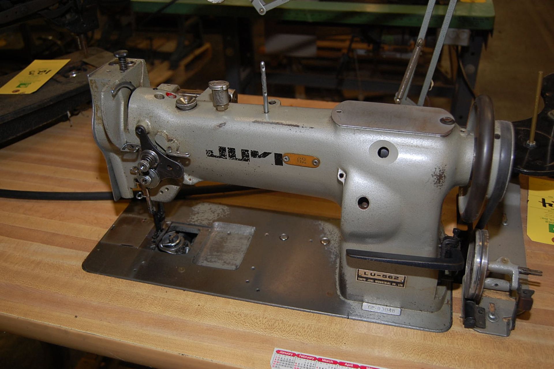 Juki Model #LU-562 Sewing Machine Mounted on Bench, Serial #4562-04336