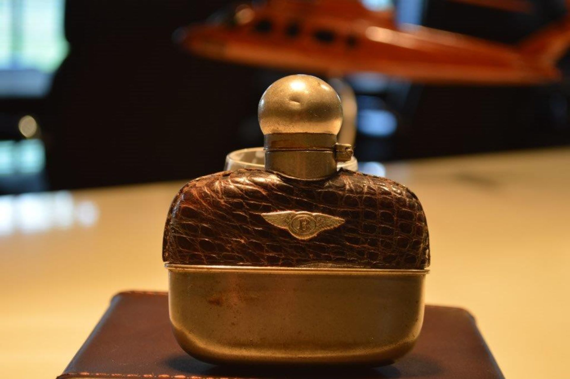 A wonderful Bentley hip flask that is thought to have been provided as a gift with the delivery of a