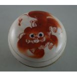 Porcelain box, Qing period, 19th century  H. 5 cm, D. 8 cm. Round covered box on low foot ring.