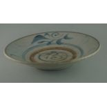 Porcelain dish, Qing period 19th century  D. 26 cm. H. 5 cm. Dish with steep wall on law foot