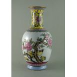 Famille Rose vase, Yongzheng mark, early 20th century  H. 20, 5 cm. Oval bellied on thickened
