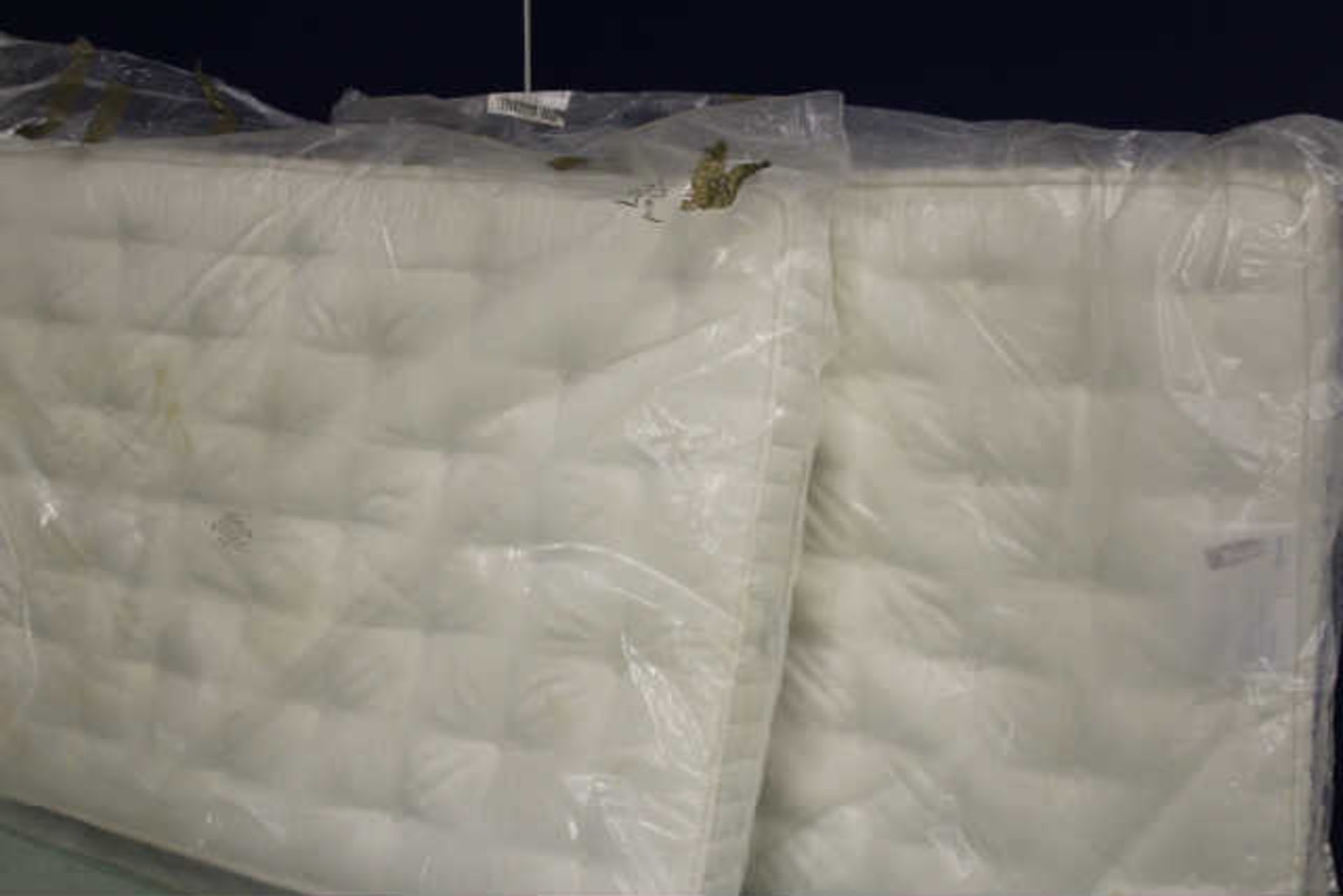 A PAIR OF USED KING SIZE MATTRESSES