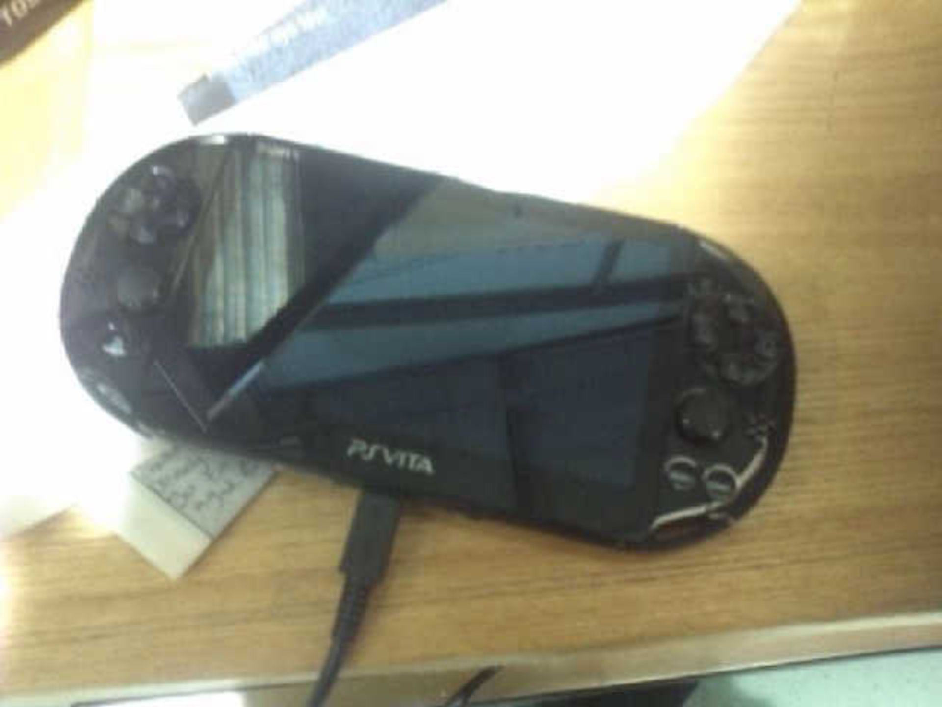 SONY PLAYSTATION VITA HANDHELD GAMES CONSOLE WITH CHARGER