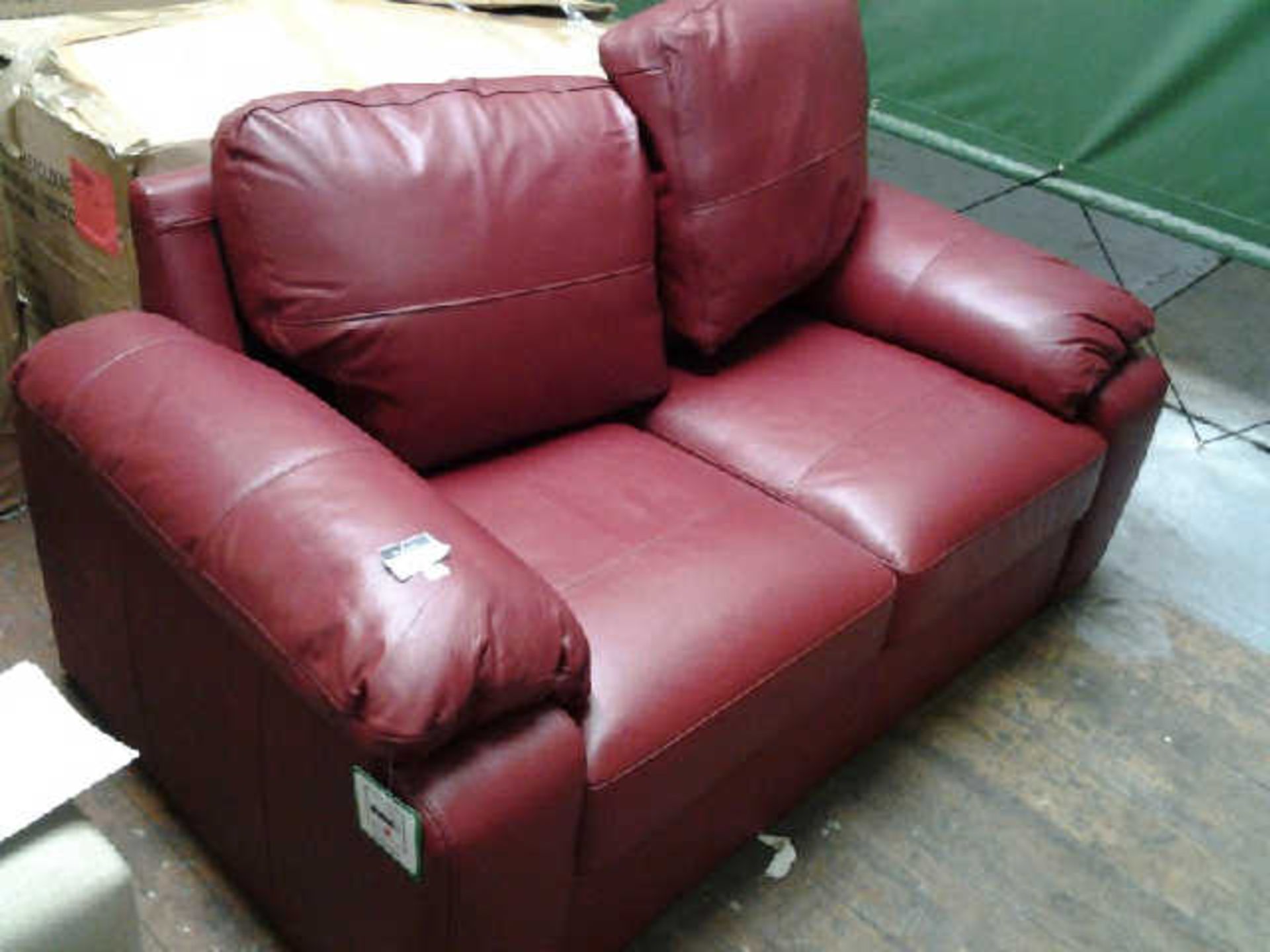 ASHMORE RED LEATHER 2 SEATER SOFA