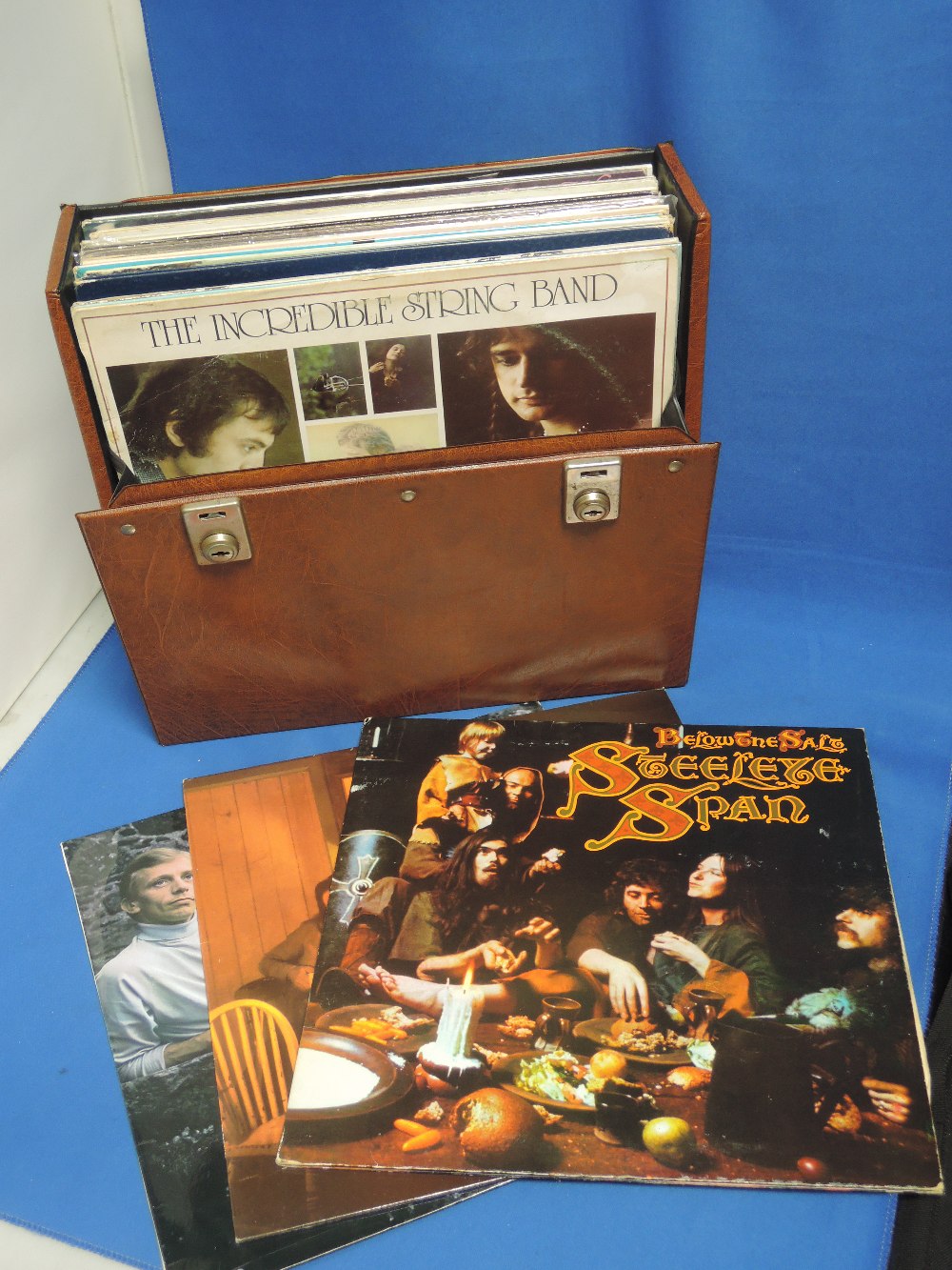 A record case of vinyl LP records including Bob Dylan, Fairport Convention, Joni Mitchell etc