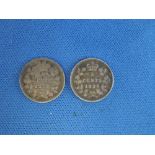 A Canadian 1884 five cents, and a Canadian 1888 five cents