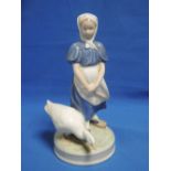 A Royal Copenhagen figure modelled as Girl with goose 527