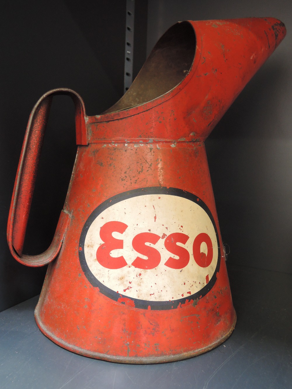 A vintage Esso branded oil can, Cadburys 1935 Jubilee chocolate tin etc