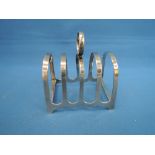A small silver toast rack of traditional form, Sheffield 1946, W & JAB, 61.5g