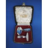 A cased silver infants starter set of plain form, Sheffield 1957 & 1965, Viner's Ltd