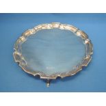 A silver salver having shaped rim and trefoilhoof feet, Sheffield 1979, Francis Howard Ltd,