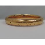 A 22ct gold wedding band,  approx 4g