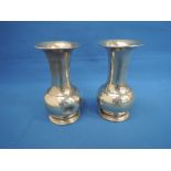 A pair of silver posy vases of bulbous form having weighted bases, Birmingham 1921, Levi & Salaman