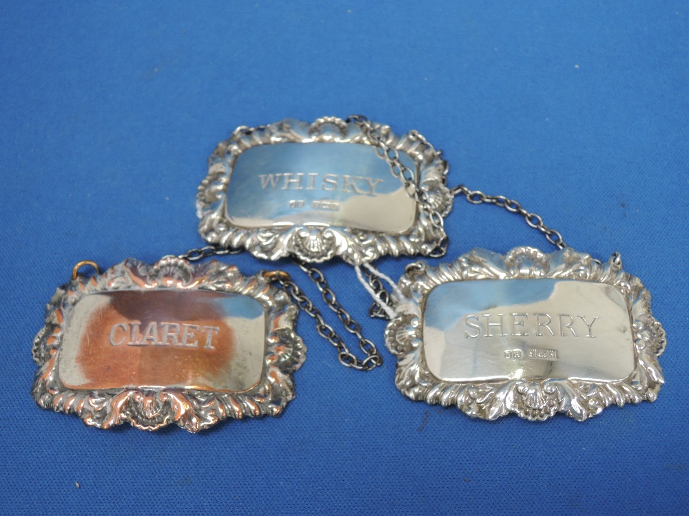 Two silver decanter labels of traditional form, Sherry & Whisky,  Birmingham 1967, John Rose, and