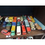 A selection of Dinky diecast vehicles including; a Foden eight wheel flatbed wagon, a Massey