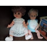 A late 20th century ruberized Cinderella doll having sleep eyes and jointed body, numbered 3M and