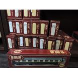 Nineteen Airfix GMR 00 gauge carriages and coaches, all boxed