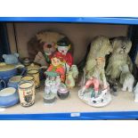 A shelf of decorative ceramic ornaments