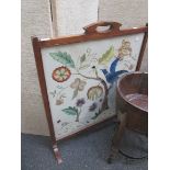 A tapestry fire screen