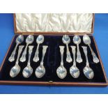 A cased set of 12 silver teaspoons in the Kings Pattern, (missing matching nips), Sheffield 1903,