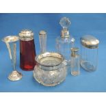 A glass perfume bottle having HM silver collar, a cut glass dressing table pot with frilled HM