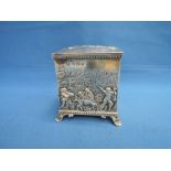 A silver tea caddy of rectangular form having extensive Grecian dancing musician repousse