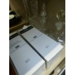 Two Dartington crystal decanters in boxes and four glass decanters/carafes
