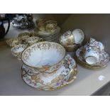 A Victorian gilt heightened tea service having painted rose decoration